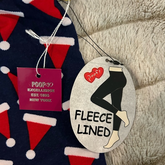 NWT Christmas/Holiday Fleece Lined Leggings. Size M/L Navy Blue w/ Santa Hats. - Picture 2 of 5